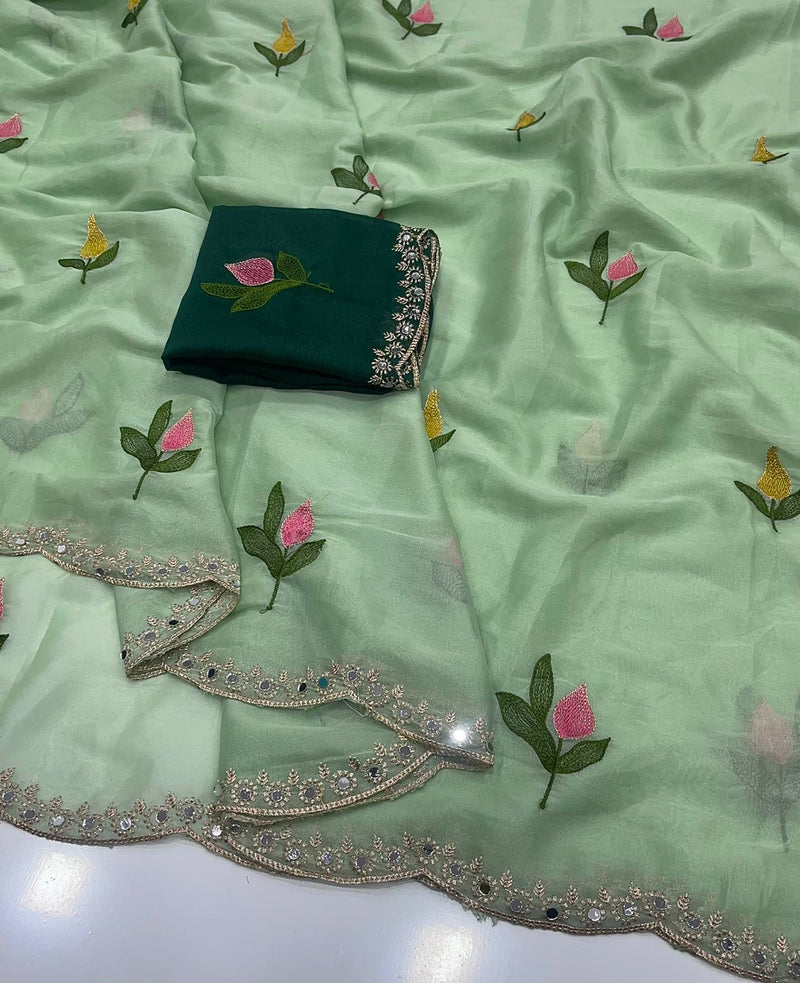 Soft Rangoli silk saree with embroidery work all over saree and beautiful  flower  design and real  mirror work with cut work border    Blouse - beautiful contract rangoli silk blouse with embroidery work