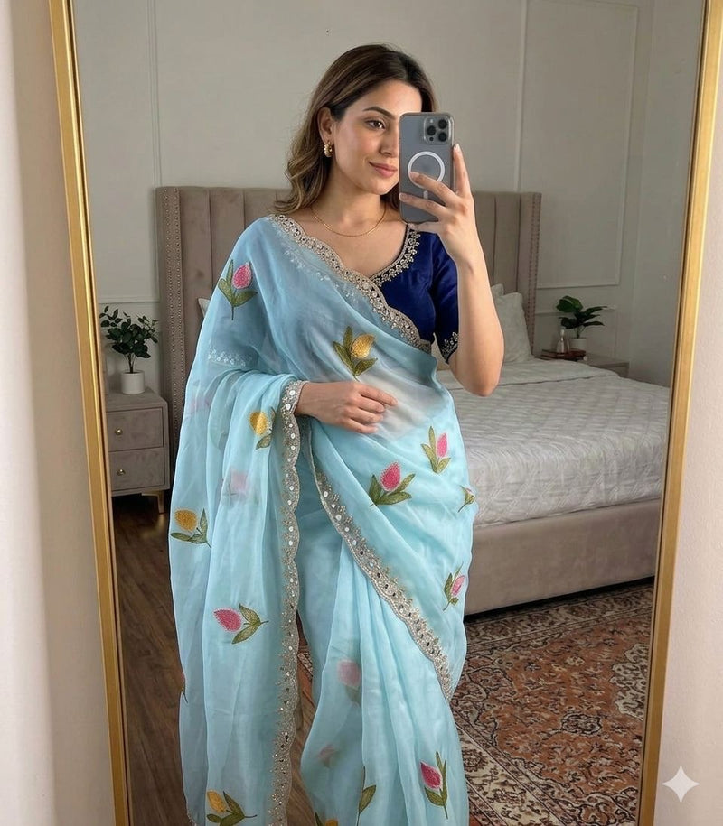 Soft Rangoli silk saree with embroidery work all over saree and beautiful  flower  design and real  mirror work with cut work border    Blouse - beautiful contract rangoli silk blouse with embroidery work