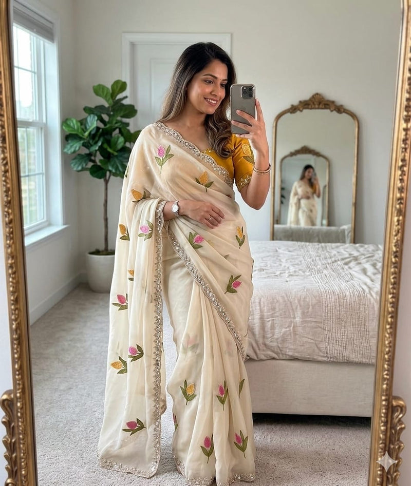 Soft Rangoli silk saree with embroidery work all over saree and beautiful  flower  design and real  mirror work with cut work border    Blouse - beautiful contract rangoli silk blouse with embroidery work