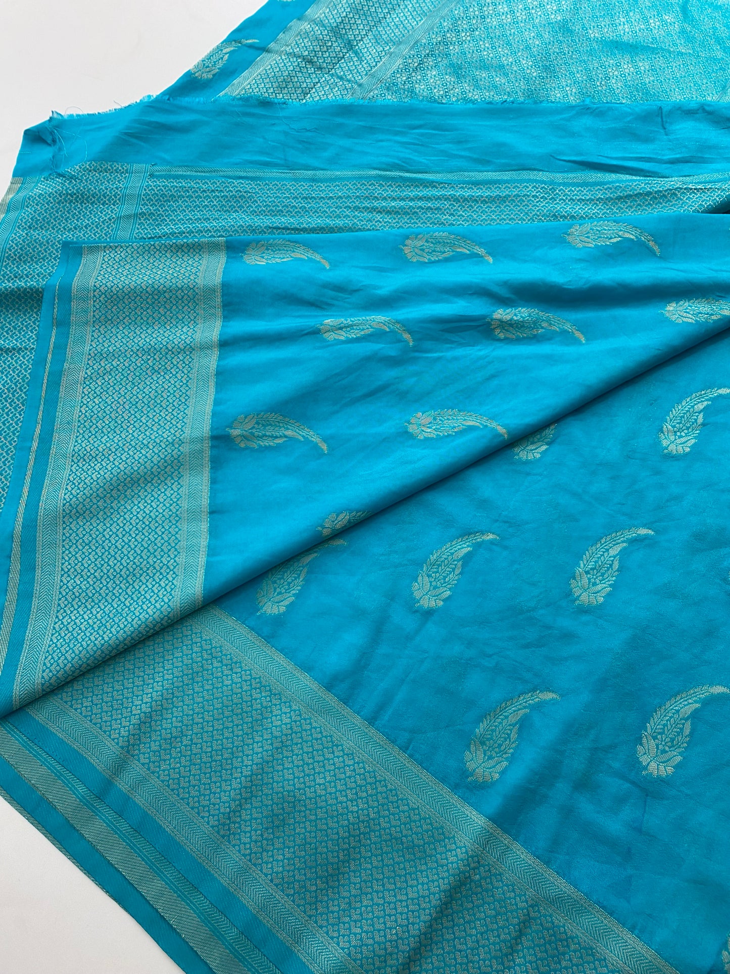 310 Banarasi silky single leaf buttas