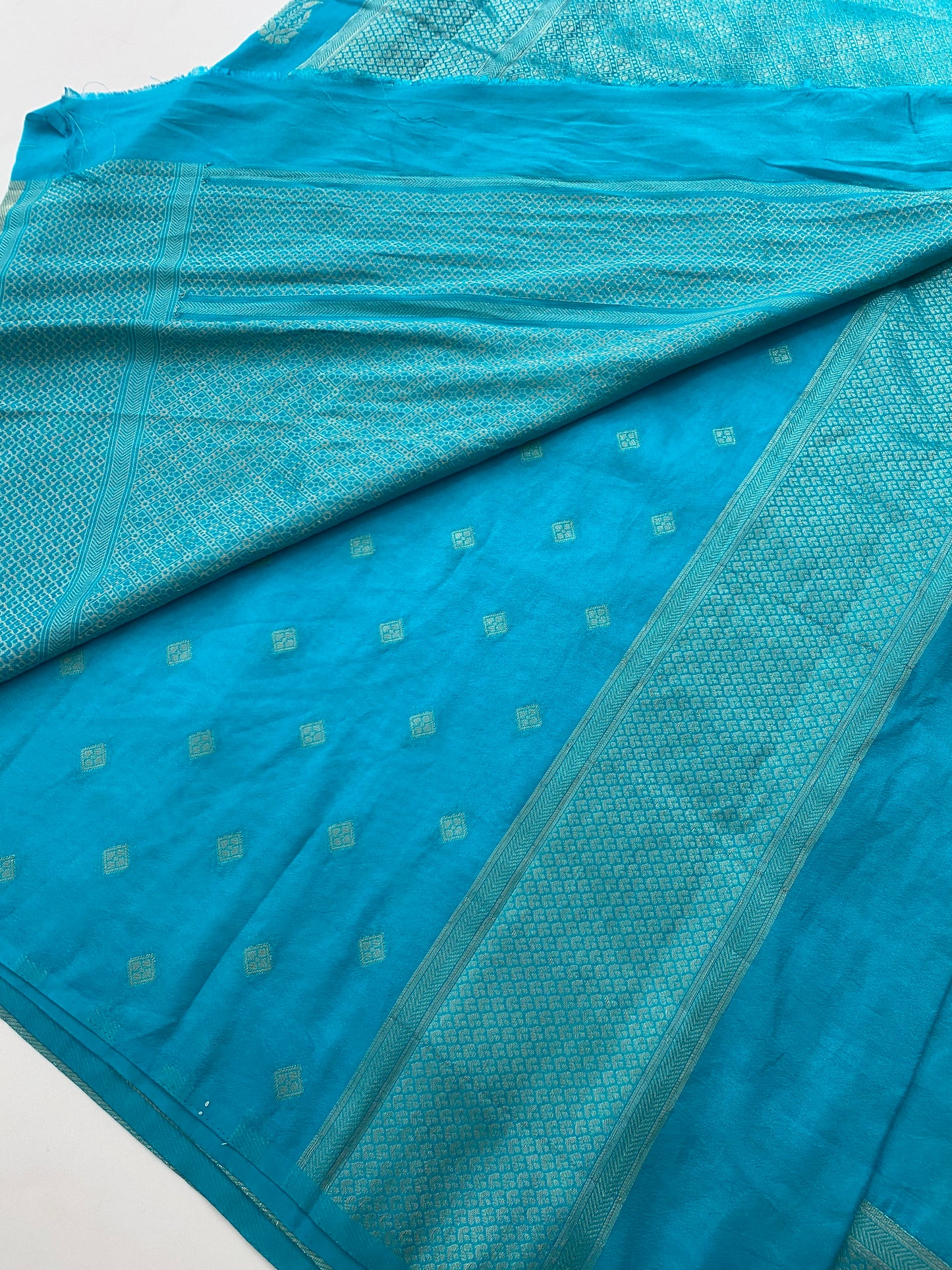 310 Banarasi silky single leaf buttas